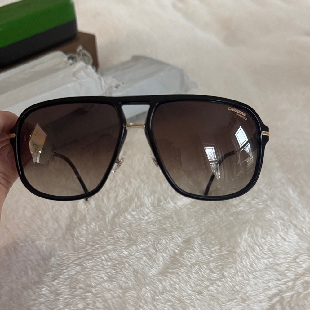 Brand new carrera aviators. Black and gold. Phenomenal sunglasses.